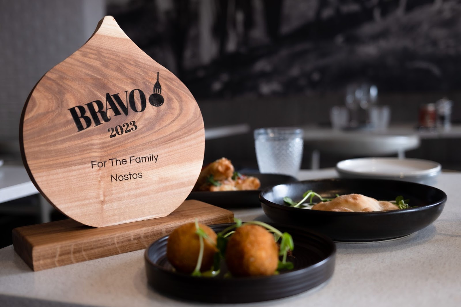 Image shows BRAVOs award given to Nostos for 'Best for the Family' 2023