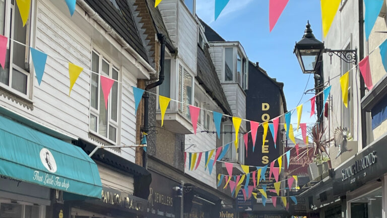 Brilliant Brighton dressed for the summer with bunting in The Lanes